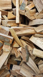 Delivery of firewood in the pile. Split and dried ready for the stove