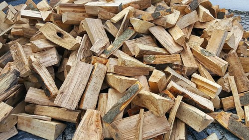 Delivery of firewood in the pile. Split and dried ready for the stove