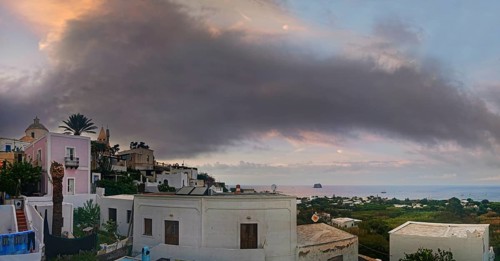 San Vincenzo island village and Stromboli volcano at sunset