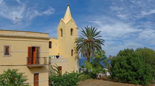 Church Chiesa di San Pietro with palm tree