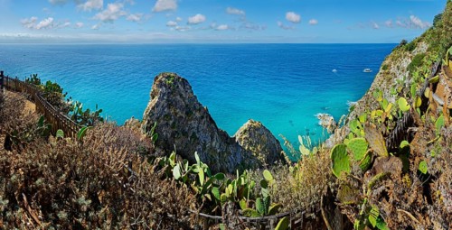 View of the rocks of Capo Vaticano with turquoise sea