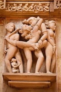Famous erotic stone carving sculptures decorating Devi Jagadamba Temple