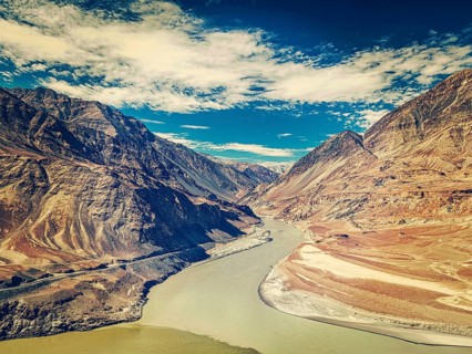 Vintage retro effect filtered hipster style image of confluence of Indus and Zanskar rivers in Himalayas. Indus valley