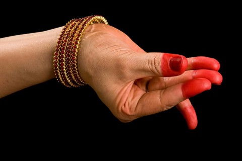 Woman hand showing Bana hasta of indian classic dance Bharata Natyam