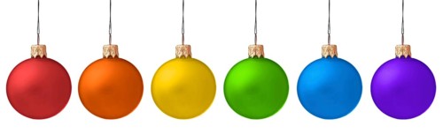 Several hanging Christmas baubles isolated on white background