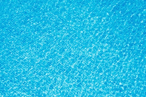 Clean blue water in pool