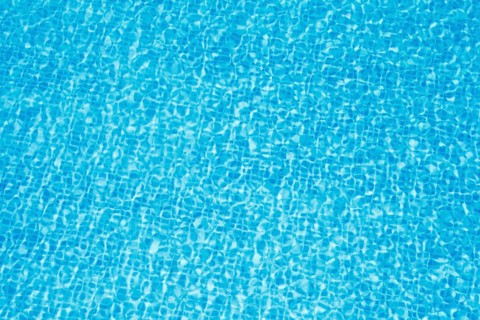 Clean blue water in pool