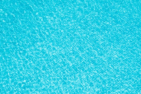 Clean blue water in pool