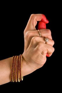 Woman hand showing Kapittha hasta