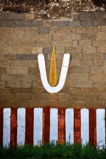 Vishnu symbol on wall of Hindu temple. India