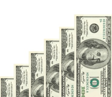 Steps made of dollars on white background