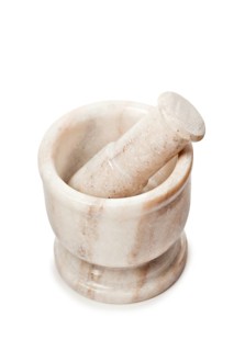 Marble mortar and pestle isolated on white background