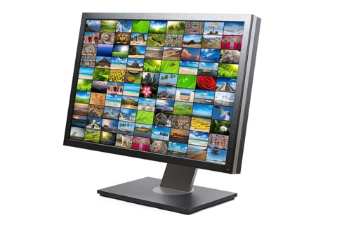 Modern LCD HDTV screen with image gallery isolated on white background