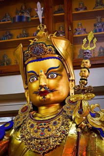 Gilded statue of Guru Padmasambhava in Tsuglagkhang temple. McLeod Ganj