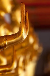 Buddha golden statue blessing hand