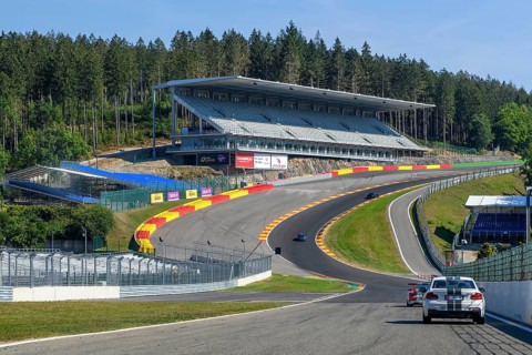 View from the perspective of a racing driver in front of overtaking in the dangerous Eau Rouge bend