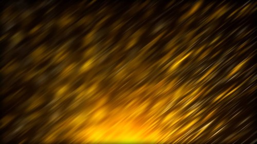 Abstract glitter background with bokeh effect and bright shiny particles