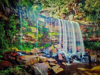 Vintage retro effect filtered hipster style image of tropical waterfall. Popokvil Waterfall