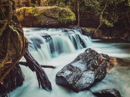 Vintage retro effect filtered hipster style image of tropical waterfall Phnom Kulen