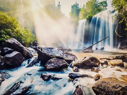 Vintage retro effect filtered hipster style image of tropical waterfall Phnom Kulen