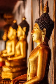 Gold sitting Buddha statues in Wat Phra That Doi Suthep