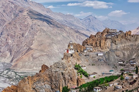 Dhankar gompa Buddhist monastery on cliff and Dhankar village in Himalayas