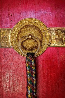 Decorated door handles of Kee gompa Tibetan Buddhist monastery. Ki