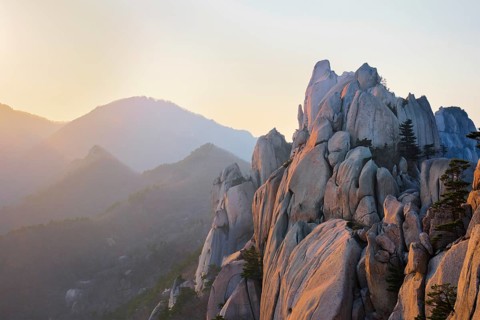 View of stones and rock formations from Ulsanbawi rock peak on sunset. Seoraksan National Park