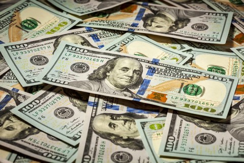 Business finance concept background of hundred dollars bank notes bills of new 2013 year edition