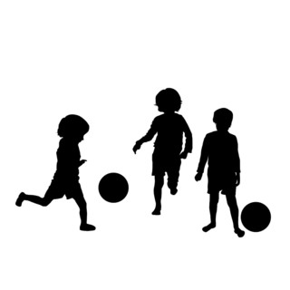 Vector silhouette of children playing soccer