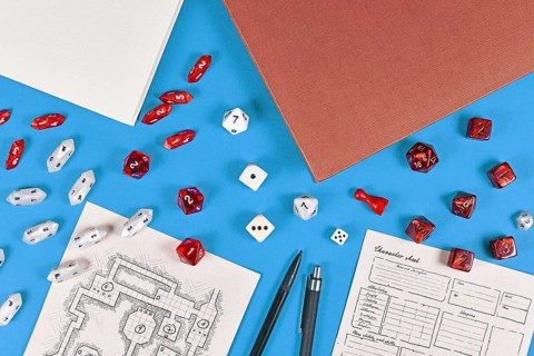 Tabletop role playing flat lay with RPG game dices