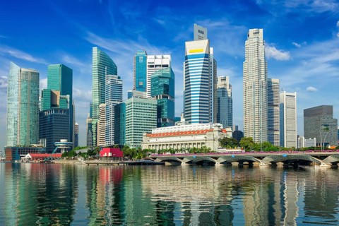 Singapore business district skyscrapers and Marina Bay in day