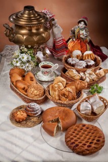 Still life with different kinds of bread on a tablecloth