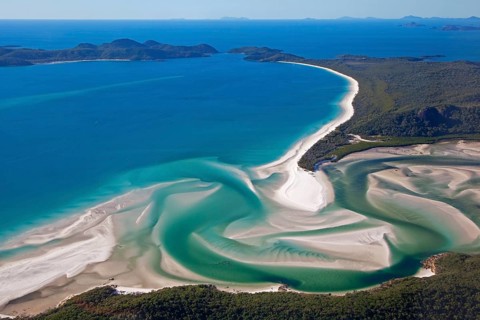 Area view of white sandy beaches and turquoise waters of Whitehaven Beach on Whitsunday Island in the Coral Sea