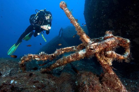 Diver and old anchor