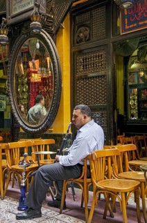 Man smoking in cairo cafe in egypt