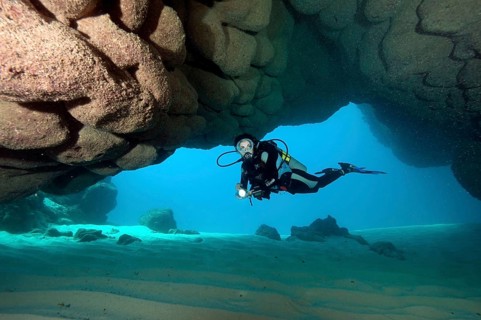 Divers in underwater cave off Punta Cana