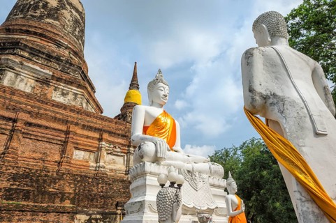 Buddha statues in front of the stupa at Wat Yai Chai Mongkhon