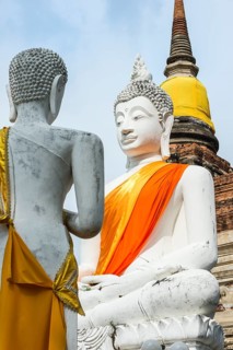 Buddha statues in front of the stupa in Wat Yai Chai Mongkhon
