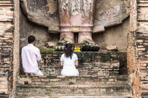 Praying worshippers