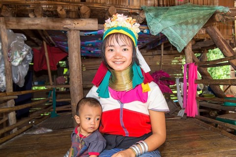 Long-necked woman with her baby