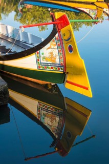 Colourful hand-painted stern of a gondola like Moliceiro