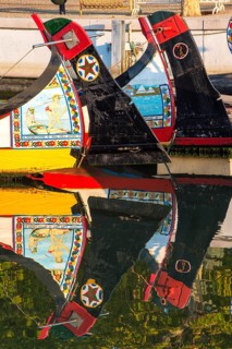 Colourful hand-painted stern of a gondola like Moliceiro