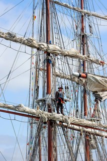 Buccaneer captain overlooking the sea from the mast during the maritime festival Oostende voor Anker