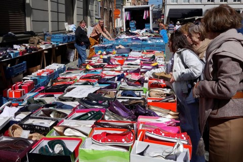 Used shoes for sale at the flea market on St. Jacobs Square in Ghent