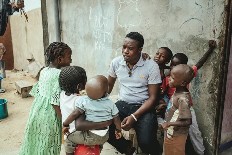 Fisherman and Captain Mukhtar in his house with various family members