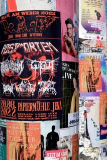 Posters on advertising pillar