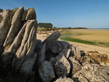 Megaliths at the edge of the intertidal zone on the beach of Guisseny in Brittany