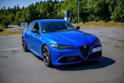 Italian sports car blue Alfa Romeo Giulia Q4 on the premises of driving safety centre FSZ II