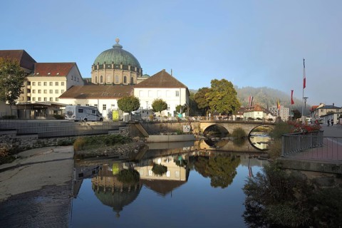 Cathedral in St. Blasien and reflection and bridge over the Alb
